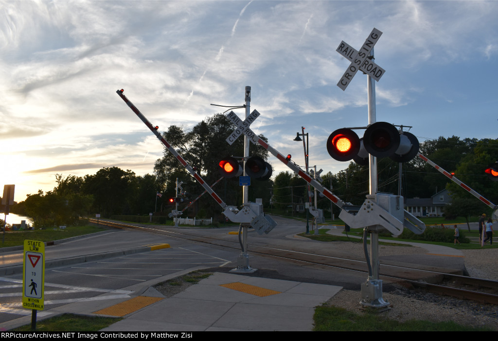 Crossing Gates at Dusk